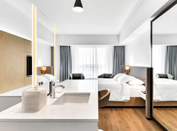Intérieur d'une chambre à l'Hôtel Mortagne.