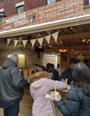 Kiosque d'exposant gourmand lors de l'événement Cabane Panache.